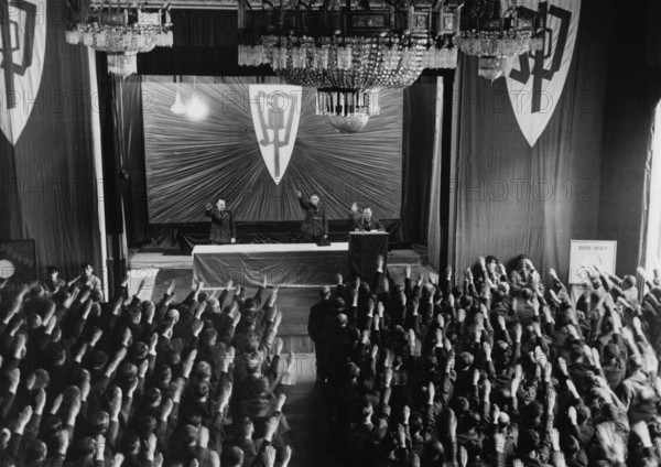 Chairman of the Sudeten German Party (SdP) reads out the eight-point program, which was put together under orders from Adolf Hitler, in Karlsbad, Germany, 24 April 1938. Some of the points were the complete equal rights of the German minority as a ethnic group, the establishment and recognition of a German settlement area within Czechoslovakia as well as the creation of German self-government with exclusively German officials. Photo: Fotoarchiv für Zeitgeschichte/Archive - NO WIRE SERVICE || Mininum fee EUR 40