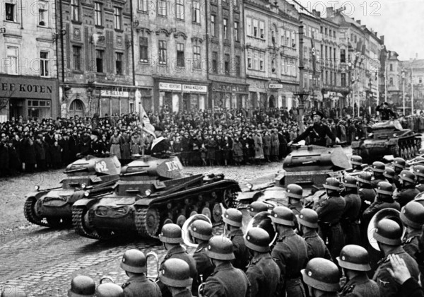 The Nazi news report German troops in Iglau, Sudetenland (today Czech Republic) in 1938/1939. The original text from the Nazi news service on the back of the picture reads: "Troops from the 4th Armoured Division march past the supreme commander of the 3rd Army Group, General of the Infantry (Johannes) Blaskowitz." Photo: Fotoarchiv für Zeitgeschichte/Archive - NO WIRE SERVICE || Mininum fee EUR 40