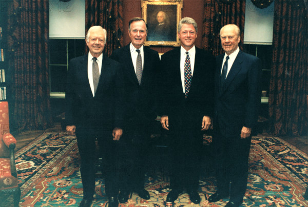 United States President Bill Clinton, center right, poses for a group photo with former US Presidents Jimmy Carter, left, George HW Bush, center left, and Gerald R. Ford, right, at the White House in Washington, DC on September 13, 1993. The leaders gathered at the White House for the Middle Eastern Treaty Signing, also known as Oslo 1, and for the North American Free Trade Agreement, also known as NAFTA, kick-off the following day. Credit: White House via CNP