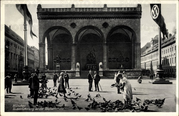 München Bayern, Taubenfütterung vor der Feldherrnhalle