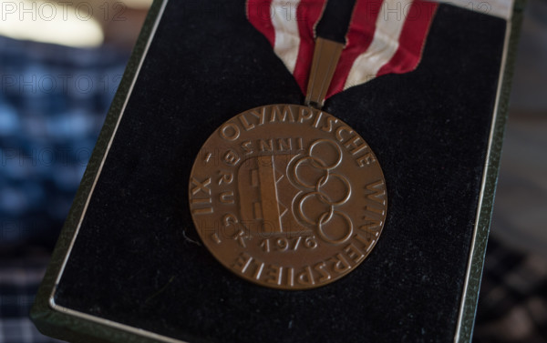 Former professional ice hockey player Lorenz Funk presents his bronze medal he won in the 1976 Winter Olympics in his home in Greiling near Bad Toelz, Germany, 02 February 2016. Funk was member of the West German national team that won the bronze medal at the 1976 Winter Olympics in Innsbruck, Austria. Six months ago, Lenz was diagnosed with cancer. Photo: MATTHIAS BALK/dpa
