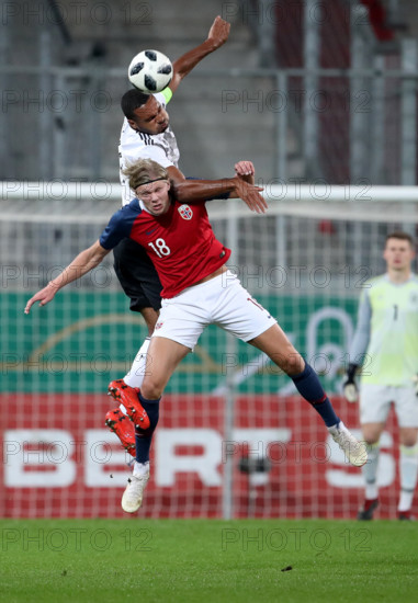 Deutschland, Ingolstadt, Audi - Sportpark, 12.10.2018, Fussball - U21 - EM Qualifikation - Deutschland - Norwegen Bild: v. l. Jonathan Tah (Deutschland, #4) h. und Erling Braut Haland (Norwegen, #) DFB REGULATIONS PROHIBIT ANY USE OF PHOTOGRAPHS AS IMAGE SEQUENCES AND/OR QUASI-VIDEO.