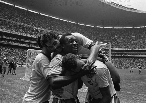 Pele is celebrating with his teammates, Roberto RIVELINO on top of them, after the 1970 FIFA World Cup finale in Mexico, Brazil - Italy 4:1.