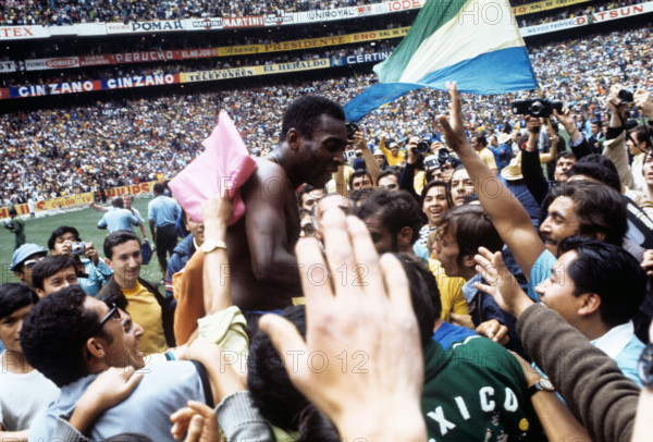 Brazil wins the 1970 Soccer World Cup in Mexico City, on 21 June 1970. Pele is celebrated by fans.