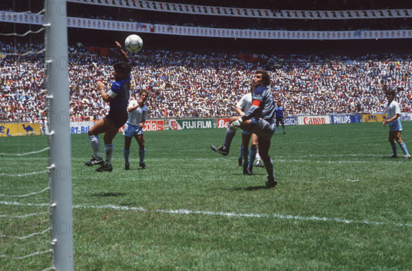 Diego MARADONA, Argentina, is scoring the legendary "Hand of God" goal against England during the 1986 FIFA World Cup in Mexico