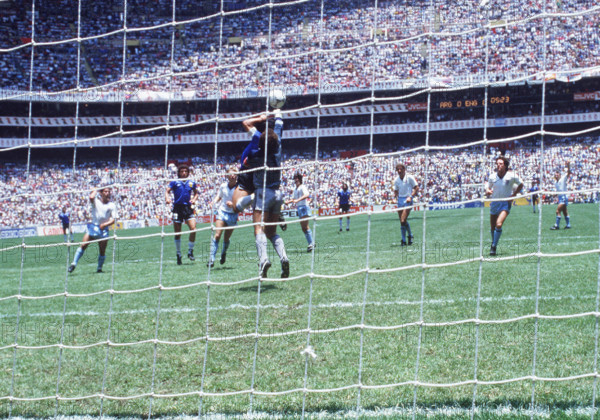 Diego Maradona, Argentina, scoring the legendary "Hand of God" goal during the England - Argentina (1:2) match at the 1990 FIFA World Cup in Mexico.
