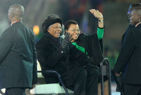 Former South African President Nelson Mandela and his wife Graca Machel during the closing ceremony prior to the 2010 FIFA World Cup final match between the Netherlands and Spain at Soccer City Stadium in Johannesburg, South Africa 11 July 2010. Photo: Marcus Brandt dpa - Please refer to http://dpaq.de/FIFA-WM2010-TC