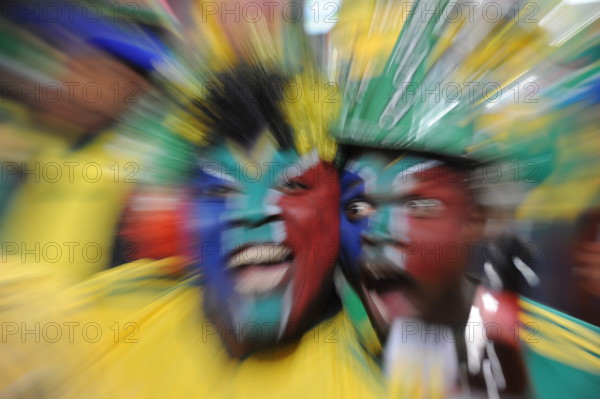 South African fans celebrate on the stand prior to the 2010 FIFA World Cup group A match between South Africa and Uruguay at Loftus Versfeld Stadium in central Cape Town, South Africa 16 June 2010. ACHIM SCHEIDEMANN Please refer to www.epa.eu