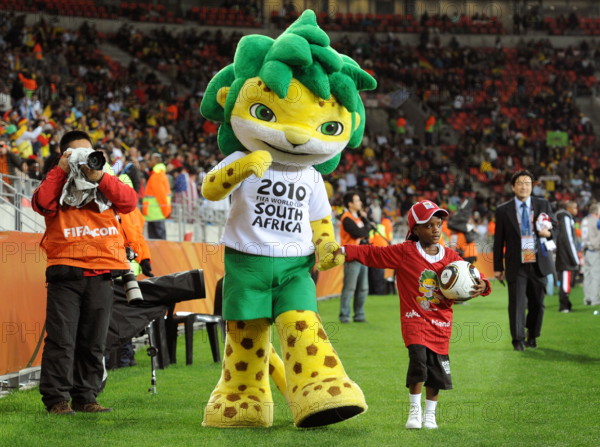 Zakumi, the official FIFA 2010 World Cup mascot, is seen before the FIFA World Cup 2010 3rd place soccer match between Uruguay and Germany at the Nelson Mandela Bay stadium in Port Elizabeth, South Africa, 10 July 2010.	MARCUS BRANDT Please ref