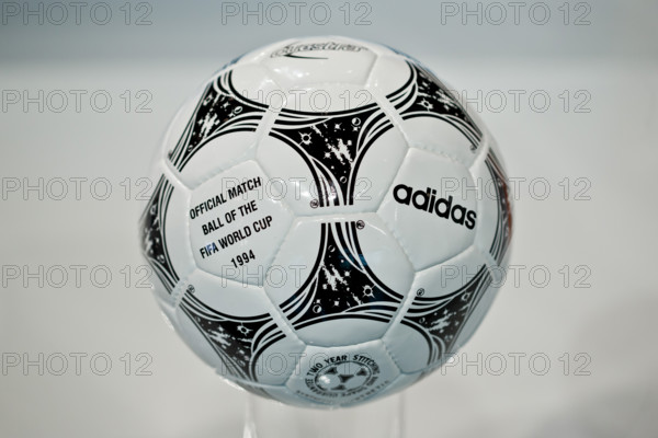 The 'Questra' soccer ball which was the official ball of the 1994 soccer world cup in USA is pictured during the general meeting of sporting goods manufacturer adidas in Fuerth, Germany, 08 May 2014. Photo: DANIEL KARMANN/dpa