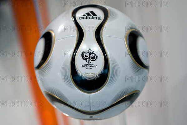 The 'Teamgeist' soccer ball which was the offcial ball of the 2006 soccer world cup in Germany is pictured during the general meeting of sporting goods manufacturer adidas in Fuerth, Germany, 08 May 2014. Photo: DANIEL KARMANN/dpa