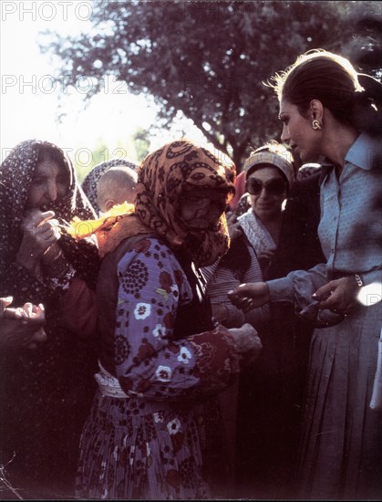 Farah Pahlavi visiting lepers, city of Machad