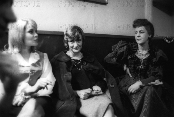 Françoise Sagan between Françoise Brion and Anouk Ferjac backstage, during the play 'Un château en suède'