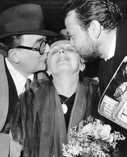 Piaf between Marcel Achard and Orson Welles, Paris, 1951