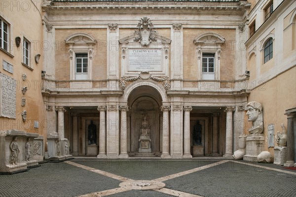 The Courtyard Of Palazzo Dei Conservatori. The Large Open-Air Space Contain Important Examples Of Roman Sculpture. On The Left We Can See Remains Of The Cell Decoration From The Temple Of The God Hadrian