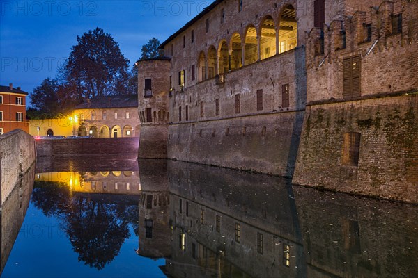 Fontanellato, Rocca Sanvitale: night view of the fortress and its moat