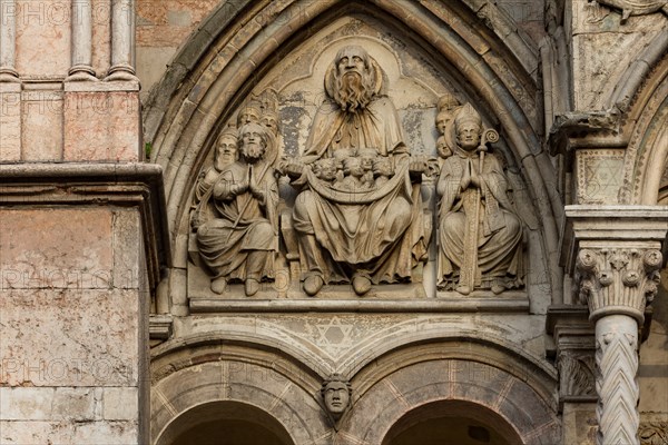 Ferrara, the Cathedral dedicated to St. George, façade detail with lunette of the Chosen.