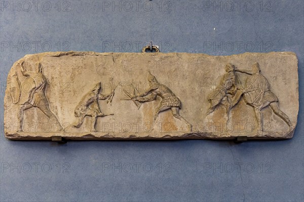 Roman slab representing a Sagittarii fighting