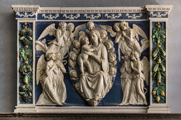 The Virgin Mary and the Infant Jesus surrounded by angels'