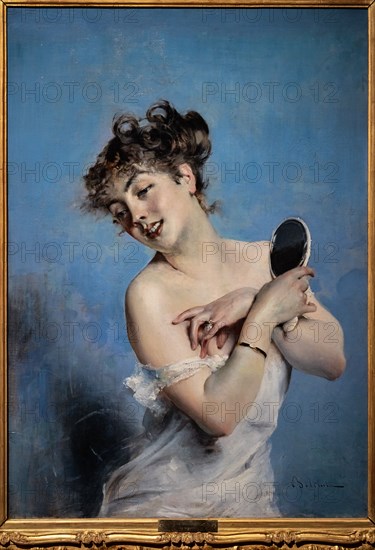 “Young Woman in Déshabillé” by Giovanni Boldini