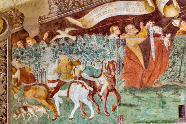 Clusone, Oratorio dei Disciplini o di San Bernardino, facciata: affreschi  "Trionfo della Morte" (parte alta) e "Danza Macabra" (parte bassa), 1485. Opera dell'artista clusonese Giacomo Borlone De Buschis.
Dettaglio del Trionfo della Morte: La Morte si trova sopra un sarcofago al cui interno si trovano ormai privi di vita il Papa e l’Imperatore con intorno serpenti, rospi e scorpioni (simboli di superbia e morte improvvisa). La Morte tiene in mando grossi cartigli che ricordano che  tutti sono destinati a lasciare il mondo terreno.

[ENG] 
Clusone, Oratory of Disciplini or St. Bernardino, façade: frescoes with the Triumph of Death on the top and a Dance of Death (Macabre Dance) in the lower register (1485). All the frescoes are by Giacomo Borlone De Buschis.
Detail of the Triumph of Death standing on a sarcophagus where the dead Pope and the Emperor lie. Theay are surrounded by serpents, scorpions and toads (symbols of pride and sudden death). Death hold big scrolls to remind ever...