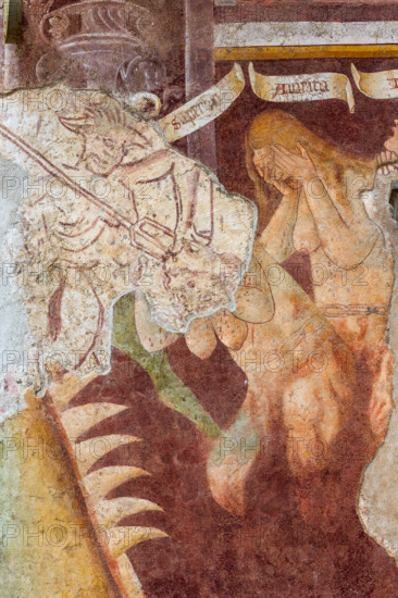 Clusone, Oratorio dei Disciplini o di San Bernardino, facciata: affreschi  "Trionfo della Morte" (parte alta) e "Danza Macabra" (parte bassa), 1485. Opera dell'artista clusonese Giacomo Borlone De Buschis. 
Particolare con un diavolo (in sinopia) che tormenta le anime di dannati per i peccati di Superbia e Avarizia.

[ENG] 
Clusone, Oratory of Disciplini or St. Bernardino, façade: frescoes with the Triumph of Death on the top and a Dance of Death (Macabre Dance) in the lower register (1485). All the frescoes are by Giacomo Borlone De Buschis.
Detail with the capital sins of Avarice and Pride.
Clusone (BG), Lombardia - Lombardy, Italia - Italy