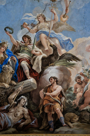 Medici Riccardi Palace, Gallery of Mirrors (or Room Luca Giordano): “The Allegory of Fortitude”, detail of the vault.
Frescoes by Luca Giordano, 1682 - 1685.

Virtue is depicted armed with a staff and shield, flanked by a lion. Above her are her Honor, who offers her a laurel wreath, and Victory, seated on a globe in the act of offering a pomegranate. Peace descends from the sky, with an olive branch and a torch to burn weapons. In the foreground are Courage, depicted as an archer (figure of Hercules) strangling a snake, with a fox trampled on the ground by a winged putto.
Palazzo Medici Riccardi, Firenze (FI) - Florence, Toscana - Tuscany, Italia - Italy