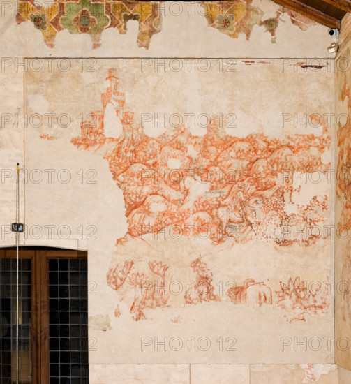 Palazzo Ducale, Pisanello room, north-east wall: “Tournament-Battle of Louvezerp”, 1430-1433, by Antonio di Puccio, known as Pisanello. detached wall painting, mixed media. The subject is taken from “Le roman en prose de Tristan”, a masterpiece of chivalric literature.
Detail with horses, knights, trees and towers of a castle.
Palazzo Ducale, Mantova (MN) - Mantua, Lombardia - Lombardy, Italia - Italy