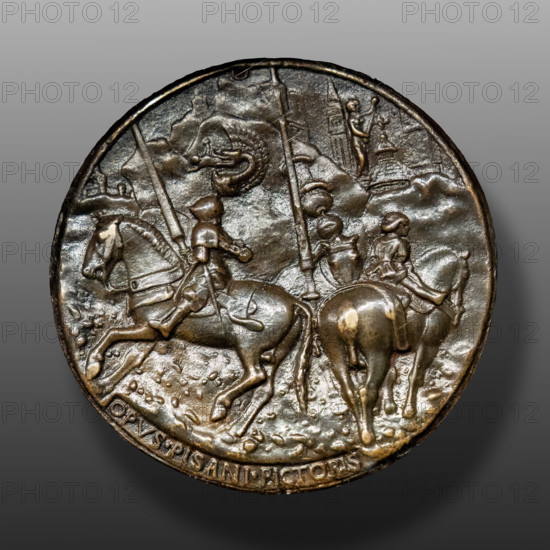 “Filippo Maria Visconti in Arms with his Squires”, bronze medal, by Pisanello (Antonio di Puccio Pisano), 1441. Reverse.
Visconti wears a tall crest with a snake devouring a Saracen. The Torrazzo and the Baptistery of Cremona are probably represented in the architecture in the background.
Castello Sforzesco, Gabinetto nu, Milano (MI) - Milan, Lombardia - Lombardy, Italia - Italy