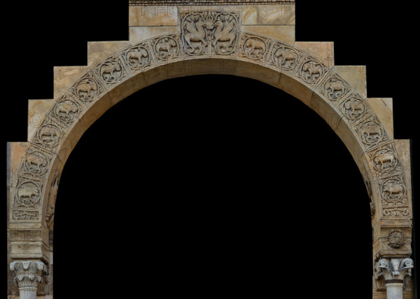 Fidenza, Duomo (Cathedral of San Donnino), right portal: the arch of the porch with the eight panels depicting the seven deadly sins, namely:
Wild boar or pig: gluttony
Bear: Anger
Badger: greed
Dog or jackal: envy
Goat: lust
Lion: pride
Donkey: sloth
Riding monkey: lust again.
In the centre, at the top: two fantastic creatures with a horned mask from whose grin a snake emerges, a clear reference to Satan.
Work by Benedetto Antelami e workshop.
Cattedrale di San Donnino, Fidenza (PR), Emilia-Romagna, Italia - Italy