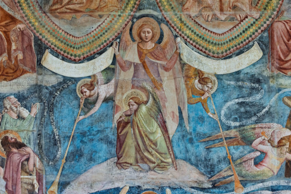 Pisa, Camposanto monumentale:
“Giudizio Universale”.  Affreschi di Buonamico Buffalmacco, 1336/1341.
Particolare con gruppo di angeli: due angeli suonatori di buccina, o tubicino), un terzo accovacciato che si chiude la bocca con una mano, e un quarto, ritto in piedi, che regge due cartigli; in quello di destra sta scritto: "venite benedicti patris mei, percipite regnum quod vobis paratum est"; in quello a sinistra: "ite maledicti in ignem aeternum qui paratus est a diabulo". 

[ENG]
Pisa, Monumental Cemetery: "The Last Judgement”. Frescoes by Buonamico Buffalmacco, 1336/1341.
Detail with a group of angels: two angels playing the tuba, a third crouching and covering his mouth with one hand, and a fourth standing, holding two cartouches; the one on the right reads: "Venite benedicti patris mei, percipite regnum quod vobis paratum est"; the one on the left reads: "ite maledicti in ignem aeternum qui paratus est a diabulo".
Camposanto Monumentale, Pisa (PI), Toscana - Tuscany, Ital...