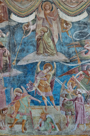 Pisa, Camposanto monumentale:
“Giudizio Universale”.  Affreschi di Buonamico Buffalmacco, 1336/1341.
Particolare con gruppo di angeli: due angeli suonatori di buccina, o tubicino), un terzo accovacciato che si chiude la bocca con una mano, e un quarto, ritto in piedi, che regge due cartigli; in quello di destra sta scritto: "venite benedicti patris mei, percipite regnum quod vobis paratum est"; in quello a sinistra: "ite maledicti in ignem aeternum qui paratus est a diabulo". 

[ENG]
Pisa, Monumental Cemetery: "The Last Judgement”. Frescoes by Buonamico Buffalmacco, 1336/1341.
Detail with a group of angels: two angels playing the tuba, a third crouching and covering his mouth with one hand, and a fourth standing, holding two cartouches; the one on the right reads: "Venite benedicti patris mei, percipite regnum quod vobis paratum est"; the one on the left reads: "ite maledicti in ignem aeternum qui paratus est a diabulo".
Camposanto Monumentale, Pisa (PI), Toscana - Tuscany, Ital...