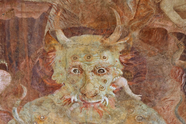 Pisa, Monumental Cemetery: “Hell”; detail with “Lucifer,” a gigantic figure twice the size of Christ the Judge. Lucifer represents pride, the root of all vice. The damned soul devoured by Lucifer is Judas Iscariot, mangled in the monster’s central mouth. Lucifer also devours Brutus and Cassius in the lateral mouths. Judas is considered the supreme traitor for betraying Christ, while Brutus and Cassius betrayed Julius Caesar, considered a benefactor and symbol of the Empire.
 Frescoes by Buonamico Buffalmacco, 1336/1341.
Camposanto Monumentale, Pisa (PI), Toscana - Tuscany, Italia - Italy