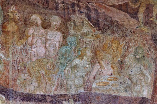 Pisa, Camposanto monumentale:
“Inferno”.  Affreschi di Buonamico Buffalmacco, 1336/1341.
Particolare con il girone dei golosi. A destra è una tavola tonda e imbandita di leccornie; i dannati sbavano ammanettati e trattenuti da sadici satanassi.

[ENG]
Pisa, Monumental Cemetery: “Hell”. Frescoes by Buonamico Buffalmacco, 1336/1341.
Detail of the circle of gluttons. On the right is a round table laden with delicacies; the damned drool, handcuffed and held by sadistic devils.
Camposanto Monumentale, Pisa (PI), Toscana - Tuscany, Italia - Italy