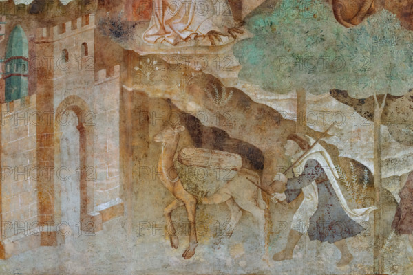 Pisa, Camposanto Monumentale: “Tebaide”,
storie degli Eremiti e dei Santi Padri ispirate alla “Vitae Patrum” del canonico domenicano Cavalca. 
La parte inferiore dell’opera nella parte a sinistra un altro monaco si avvicina alla porta della città con un cammello carico. 
Affreschi di Buonamico Buffalmacco, 1336/1341.


[ENG]
Pisa, Monumental Cemetery: “Thebaid”, Stories of the Hermits and the Holy Fathers inspired by the Vitae Patrum by the Dominican Domenico Canon Cavalca. 
The lower part of the work depicts, on the left, a monk approaching the city gate with a loaded camel .
Frescoes by Buonamico Buffalmacco, 1336/1341.
Camposanto Monumentale, Pisa (PI), Toscana - Tuscany, Italia - Italy