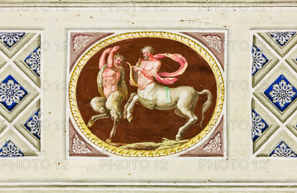 Palermo, Palazzo Reale o Palazzo dei Normanni, Appartamento Reale, Sala Rossa, la volta: particolare decorativo con cameo che rappresenta Chirone e Achille.

[ENG]
Palermo, The Royal Palace or Palazzo dei Normanni (Palace of the Normans), The Royal Apartment, The Red Room: detail of the decoration depicting a cameo with Achilles and Chiron.
Palazzo Reale (Palazzo dei Norma, Palermo (PA), Sicilia - Sicily, Italia - Italy