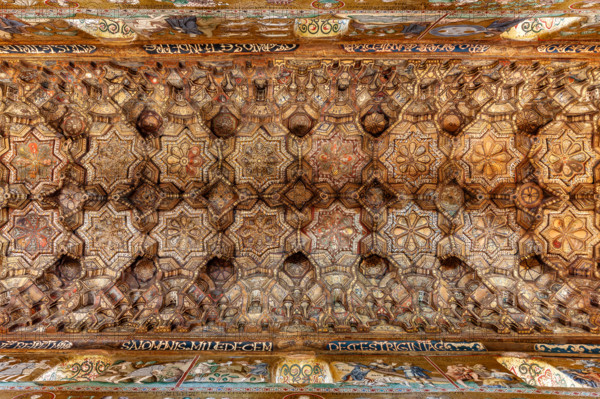 Palermo, The Royal Palace or Palazzo dei Normanni (Palace of the Normans), The Palatine Chapel (Basilica), central nave: wooden ceiling, created by Fatimid school masters and consisting of wooden coffers called muqarnas, painted with rare images (phytoform and zoomorphic ornaments, birds, fantastic and mythological animals, including human figures in hunting, making war and love, players, dancers and belly dancers, chess players: These figures are generally prohibited by the Muslim tradition) and Cufic inscriptions (1143).
Palazzo Reale (Palazzo dei Norma, Palermo (PA), Sicilia - Sicily, Italia - Italy