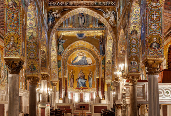 Palermo, Palazzo Reale o Palazzo dei Normanni,  Cappella Palatina (Basilica), veduta generale. Sullo sfondo l'abside con i mosaici (1143). In alto  l'Annunciazione; nel catino Cristo Pantocrator; nel tamburo dell'abside, la Vergine in trono con a sinistra Pietro apostolo e Maria Maddalena, a destra Giovanni Battista e Giacomo apostolo. Queste due ultime figure furono aggiunte a fine XVIII secolo.

[ENG]
Palermo, The Royal Palace or Palazzo dei Normanni (Palace of the Normans), The Palatine Chapel (Basilica): view. In the background the apse and the mosaics (1143). Above the Annunciation; in the bowl - shaped vault, Christ Pantocrator; in the tambour of the apse, the Virgin enthroned with St. Peter Apostle and Mary Magdalene, and John the Baptist and St James Apostle on the right. These last two figures were added at the end of the eighteenth century.
Palazzo Reale (Palazzo dei Norma, Palermo (PA), Sicilia - Sicily, Italia - Italy