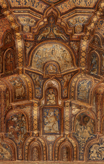 Palermo, Palazzo Reale o Palazzo dei Normanni,  Cappella Palatina (Basilica), navata centrale:  soffitto ligneo, realizzato da maestri di scuola fatimide e costituito da cassoni lignei a muqarnas, dipinte con immagini rare (ornamenti fitoformi e zoomorfi, uccelli, animali fantastici e mitologici, tra cui figure umane in scene di caccia, di guerra e d'amore, suonatori, danzatori e danzatrici del ventre, giocatori di scacchi. Figurazioni generalmente vietate dalla tradizione musulmana) e iscrizioni cufiche (1143). 
Particolare.

[ENG]
Palermo, The Royal Palace or Palazzo dei Normanni (Palace of the Normans), The Palatine Chapel (Basilica), central nave: wooden ceiling, created by Fatimid school masters and consisting of wooden coffers called muqarnas, painted with rare images (phytoform and zoomorphic ornaments, birds, fantastic and mythological animals, including human figures in hunting, making war and  love, players, dancers and belly dancers, chess players: These figures are gene...