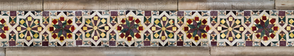 Palermo, Palazzo Reale o Palazzo dei Normanni, Torre Pisana, Sala di Re Ruggero (la sala voluta da Re Ruggero II d'Altavilla), rivestimento marmoreo: dettaglio di mosaici a motivi geometrici.

[ENG]
Palermo, The Royal Palace or Palazzo dei Normanni (Palace of the Normans), Pisana Tower,  the King Roger Room (the Room which was commissioned by King Roger II d'Altavilla), marble coverings: detail of mosaic with geometric pattern.
Palazzo Reale (Palazzo dei Norma, Palermo (PA), Sicilia - Sicily, Italia - Italy