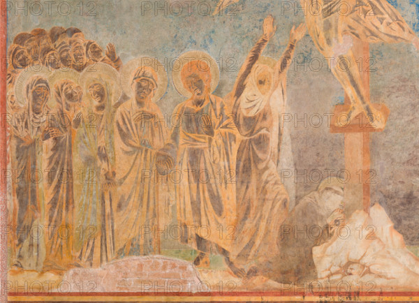 Assisi, Basilica superiore di San Francesco, transetto meridionale, parete est, Crocifissione: particolare con le Pie Donne, la Vergine, San Giovanni Evangelista, la Maddalena e San Francesco ai piedi della croce. 
Affreschi di Cimabue (Cenni di Pepo 1277-1283?).

[ENG]
Assisi, Upper Basilica of San Francesco, south transept, east wall, Crucifixion: detail with the Pious Women, the Virgin, Saint John the Evangelist, the Magdalen and Saint Francis at the foot of the cross.
Frescoes by Cimabue (Cenni di Pepo 1277-1283?).
Basilica superiore di San France, Assisi (PG), Umbria, Italia - Italy