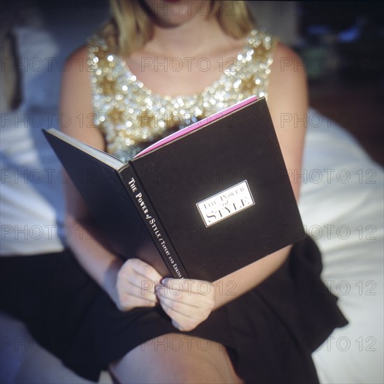 Woman Reading Book on Style