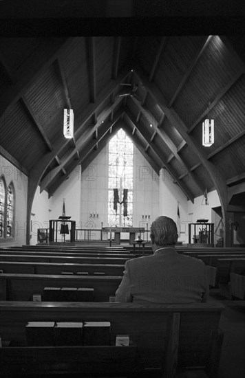 Man Sitting Alone in Church, Rear View