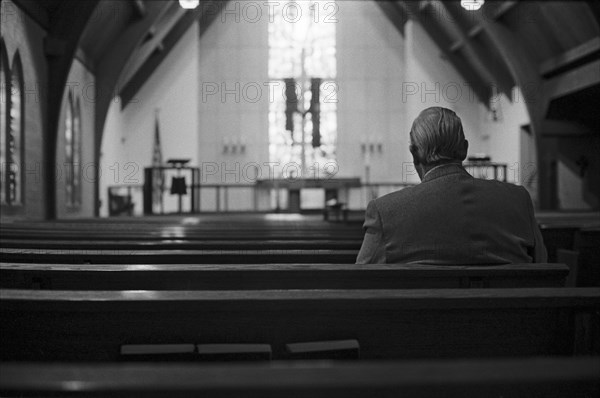 Man Sitting Alone in Church, Rear View
