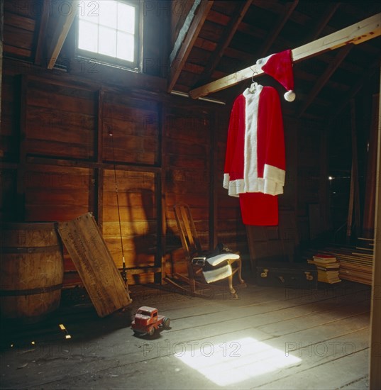 Santa Claus Suit Hanging in Attic
