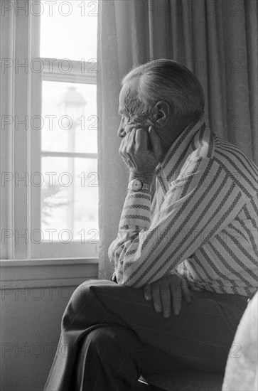 Elderly Man Seated in Window
