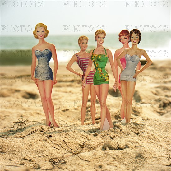 Female Paper Dolls in Swimsuits on Beach