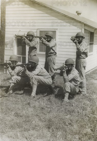 Group of Soldiers Displaying Proper Shooting Position During Training Session, WWII, 2nd Battalion, 389th Infantry, US Army Military Base Indiana, USA, 1942