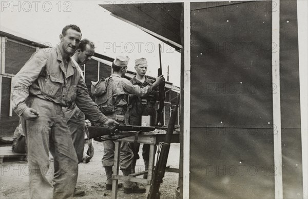 Soldiers Cleaning Rifles, WWII, 2nd Battalion, 389th Infantry, US Army Military Base Indiana, USA, 1942