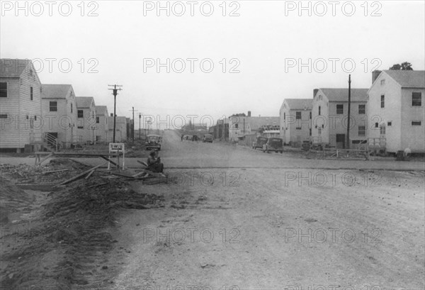 Military Buildings Along Dirt Road, WWII, 2nd Battalion, 389th Infantry, US Army Military Base Indiana, USA, 1942